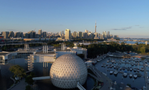 An aerial image of Ontario Place with Toronto skyline in the distance.