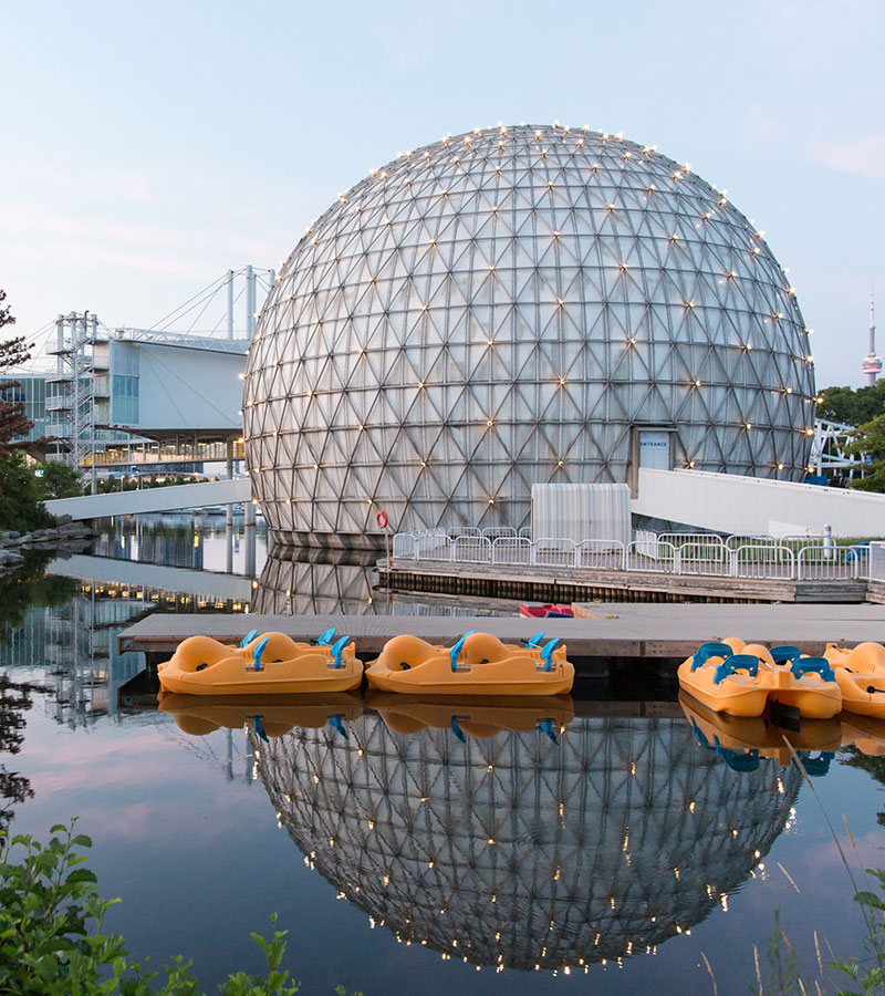 Cinesphere and empty paddle boats along a dock