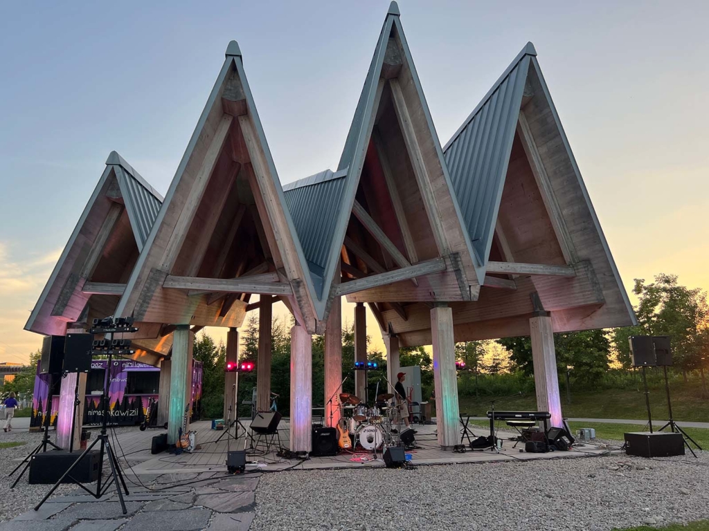 A picture of lights and instruments set up under the Trillium Park Pavilion 